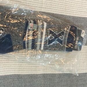 NWT + used pair of Xavier socks